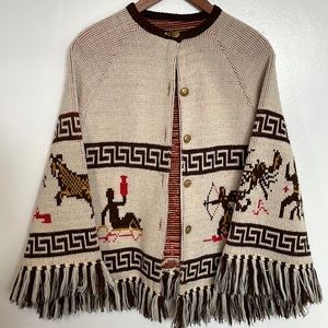 Vintage 60’s-70’s Montgomery Ward Zodiac cape like sweater. Size small/medium.